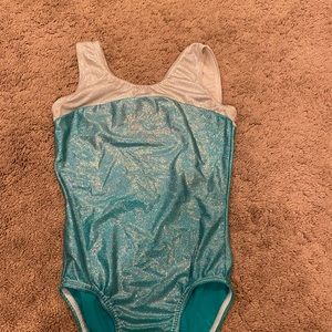 worn once, washed in cold water only, never put in dryer, air dried only.